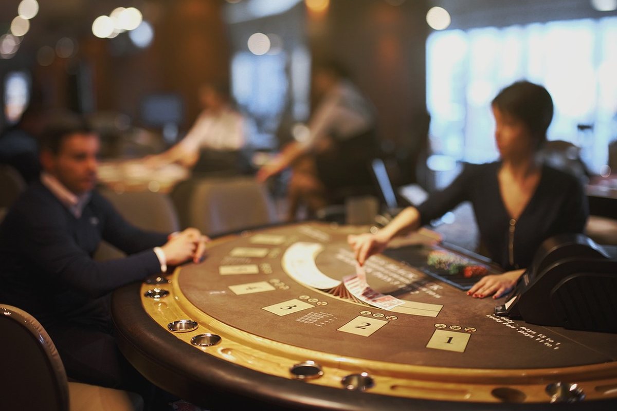 Blackjack table with cards and dealer shoe