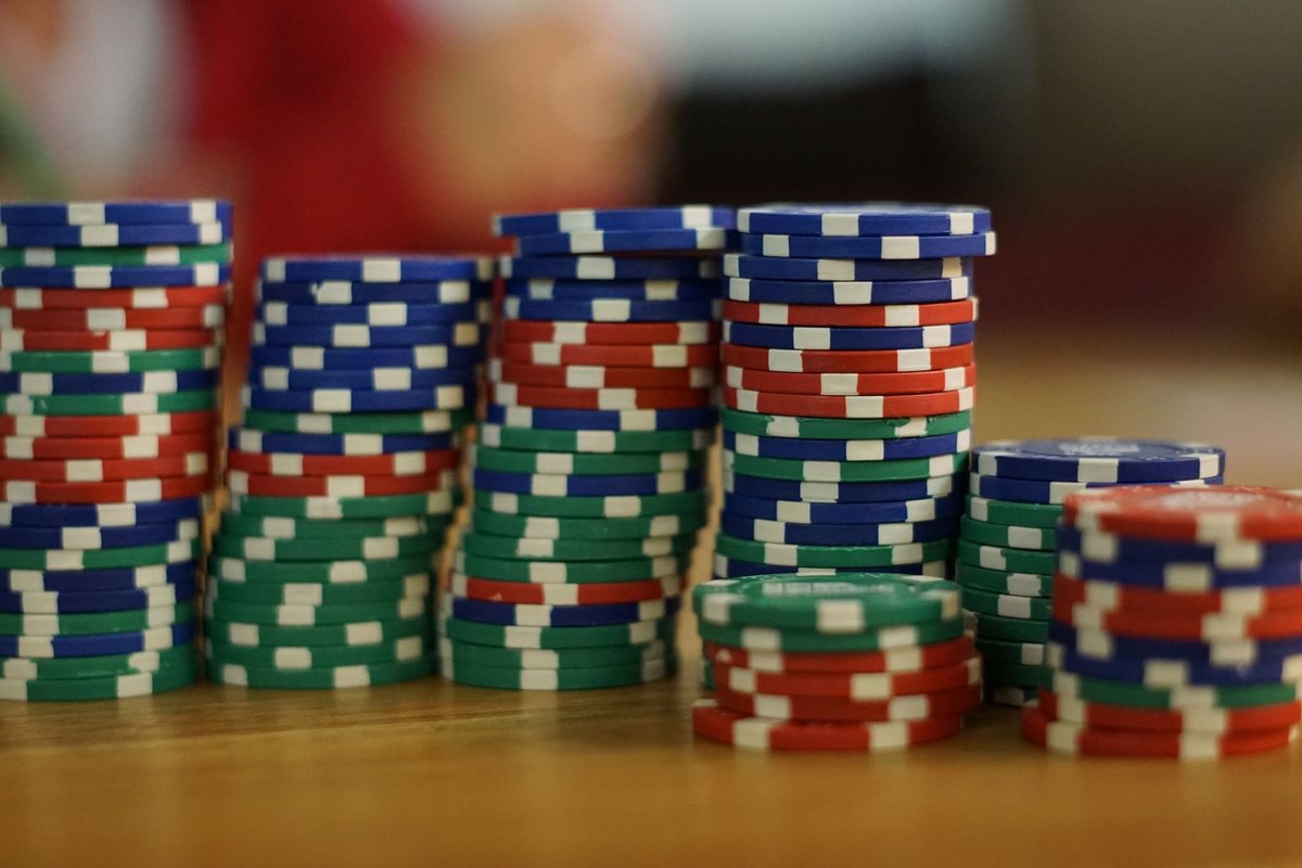 Poker room table with chips and cards
